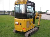 2023 Caterpillar 301.8 mini excavator, rear three-quarter view