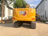 2023 Caterpillar 320GC crawler excavator, rear view