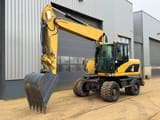 2008 Caterpillar M315D wheel excavator, front three-quarter view