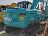 2018 Kobelco SK140 crawler excavator rear three-quarter view