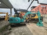 Kobelco SK60 mini excavator, side view