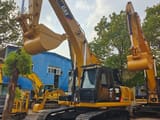 2024 Caterpillar 329D crawler excavator, front three-quarter view