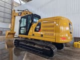 2023 Caterpillar 320GC crawler excavator, rear three-quarter view