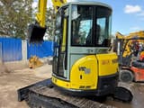 2025 Yanmar VIO55 mini excavator, rear three-quarter view