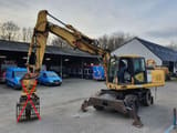 2006 Komatsu PW180-7K wheel excavator, side view