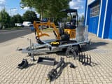 Berger Kraus BK1300JSR mini excavator on trailer with attachments