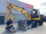 2019 Komatsu PW118MR-11 wheel excavator, side view