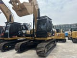 2022 Caterpillar 320D гусеничний екскаватор, передній три-чвертний вид