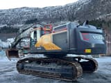2023 Volvo EC530EL crawler excavator, rear three-quarter view