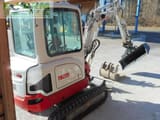 2018 Takeuchi TB225 mini excavator, rear three-quarter view