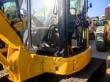 Komatsu PC55MR-5 Mini Excavator, side view of cab and tracks