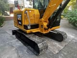 2024 Caterpillar 306E2 mini excavator rear three-quarter view