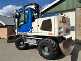 2015 Liebherr A914 wheel excavator, rear three-quarter view