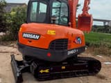 2025 Doosan DH60-7 mini excavator, front three-quarter view