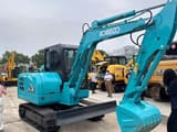 2024 Kobelco SK60 mini excavator, three-quarter front view