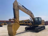 2021 Caterpillar 330GC crawler excavator, front three-quarter view