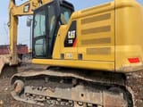 2022 Caterpillar 330 crawler excavator, side view