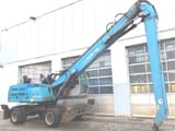 2016 Fuchs MHL335 E material handler, side view