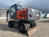 2019 Atlas 150W wheel excavator, rear three-quarter view