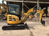 2022 Caterpillar 303 CR mini excavator, side view