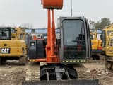 Hitachi ZX70 mini excavator, front view