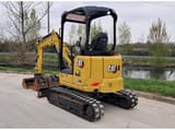 2023 Caterpillar 302.7 crawler excavator, rear three-quarter view