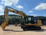 2025 Caterpillar 320D2 crawler excavator, side profile view