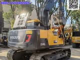 2020 Volvo EC140DL crawler excavator, rear three-quarter view