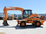 2007 CASE WX145 wheel excavator side view