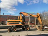 2001 Caterpillar M318 wheel excavator, side profile view
