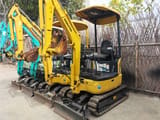 2023 Komatsu PC18MR-3 mini excavator, front three-quarter view