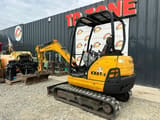 2016 Kubota KX61-3 mini excavator, rear three-quarter view