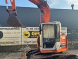 Hitachi EX60UR mini excavator, side view