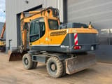 2015 Hyundai R180W-9A wheel excavator, rear three-quarter view