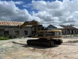 2020 Caterpillar 320BL crawler excavator, rear three-quarter view