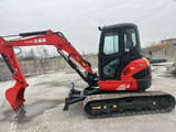 2023 Kubota U55-4 mini excavator, side profile view