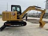 2022 Caterpillar 305.5E2 mini excavator, side profile view