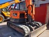 2017 Doosan DX85R-3 mini excavator, rear three-quarter view