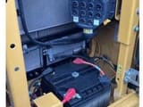 2022 Caterpillar 313GC crawler excavator battery and cooling compartment view