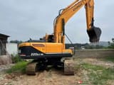 Hyundai 220LC-9S crawler excavator, rear three-quarter view