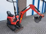 2014 Kubota U10-3 mini excavator, rear three-quarter view