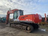 2003 O&K RH9.5 crawler excavator, rear three-quarter view