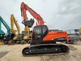 2023 Doosan DX225LC-9C crawler excavator, side profile view