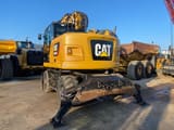 2018 Caterpillar M315F wheel excavator, rear three-quarter view