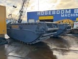 2025 Caterpillar 320 Amphibious Excavator undercarriage view