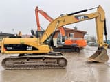 2007 Caterpillar 323DL crawler excavator, side profile view