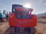 Hitachi ZX60 mini excavator rear view with engine compartment open