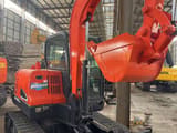 2020 Doosan DX60-9C mini excavator, front three-quarter view