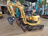 2014 Komatsu PC10MR crawler excavator, side view