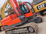 2022 Doosan DX140LC-5 excavator, rear three-quarter view